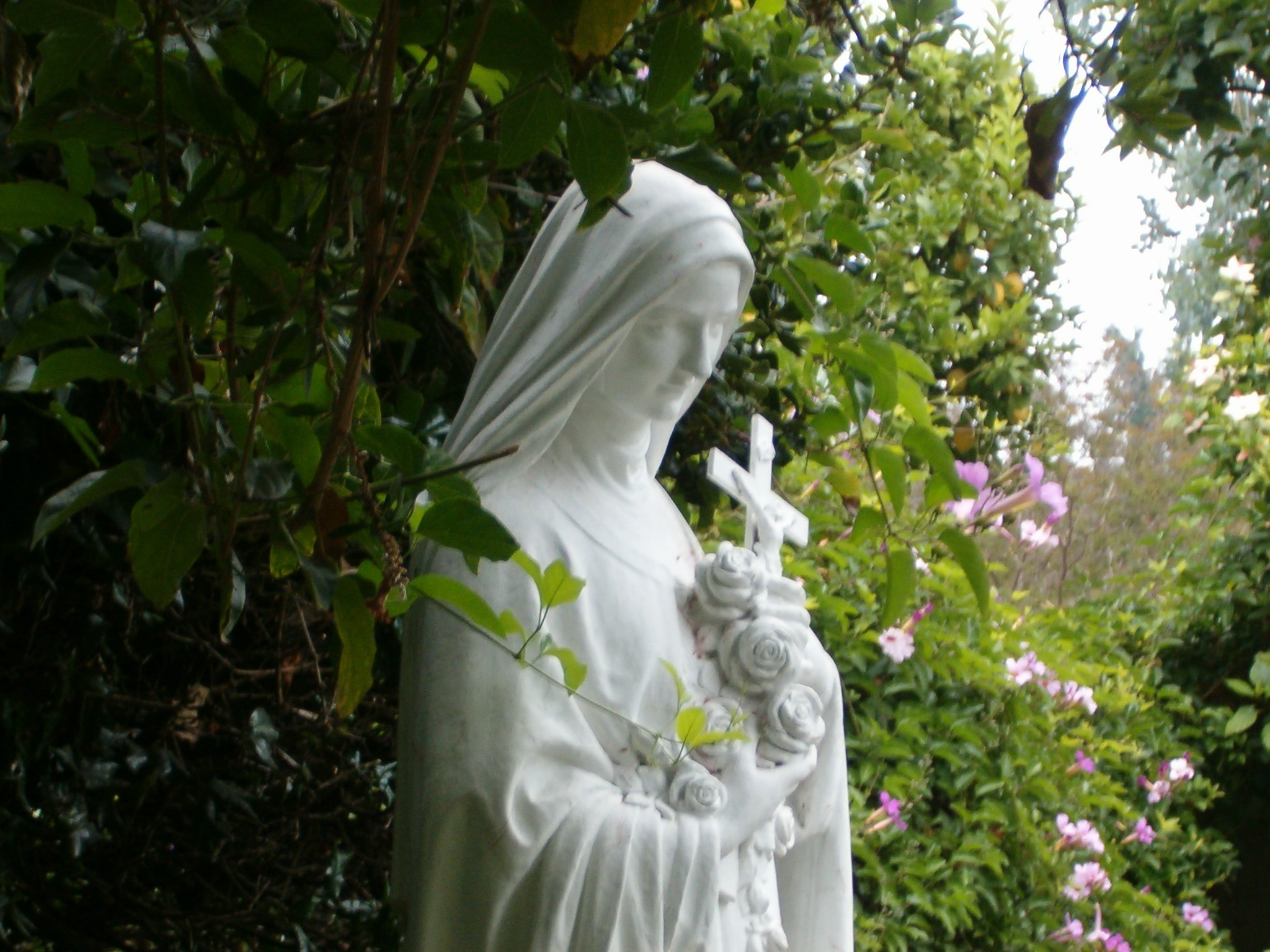 Statue of St. Therese in nature