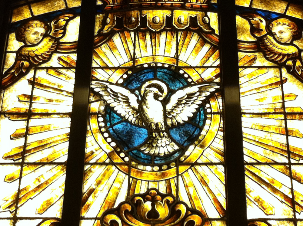 stained glass window of the Holy Spirit