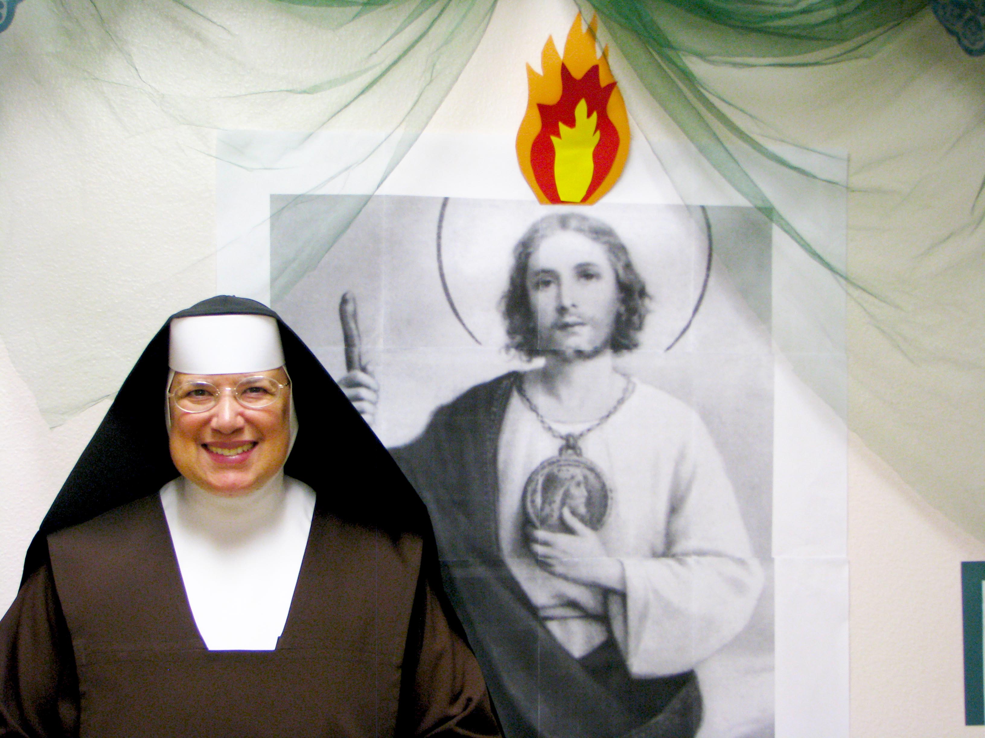 Mother Judith next to photo of St. Jude