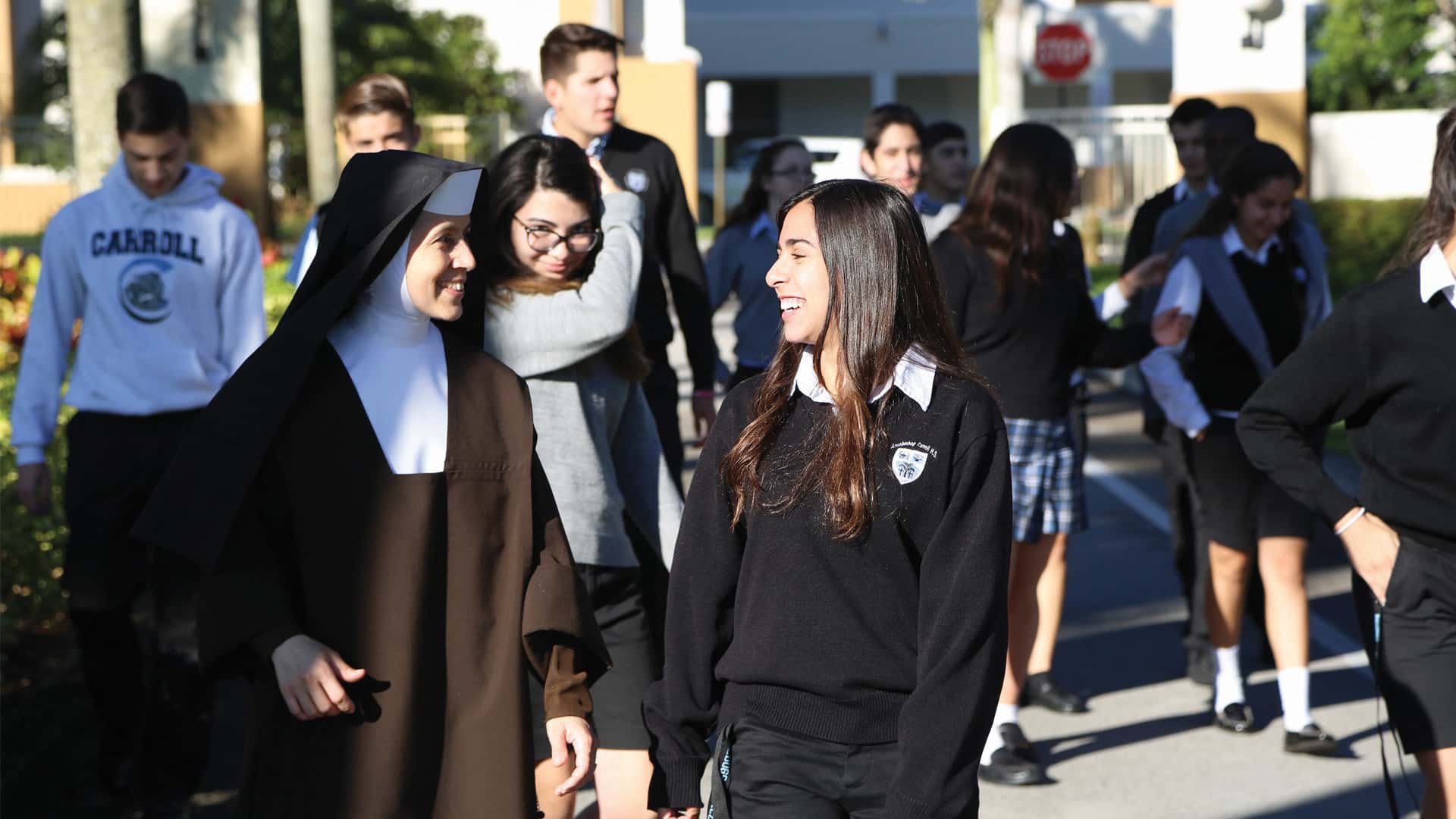 Sister walking with Students