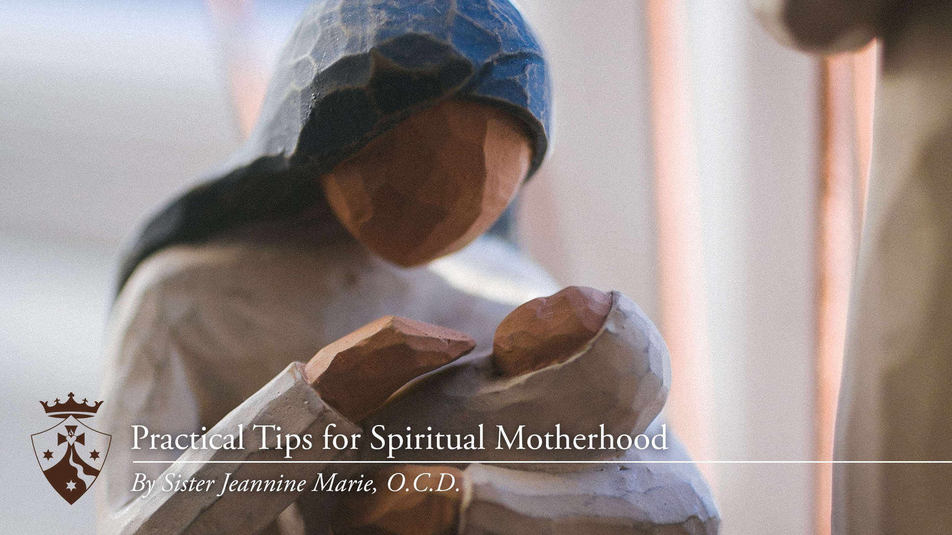 Wood carving of Mary holding Jesus, 'Practical Tips for Spiritual Motherhood, By Sister Jeannine Marie, O.C.D'